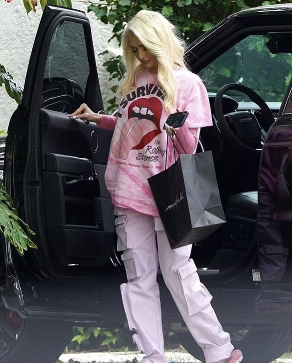 Erika Jayne shows off weight loss while returning home after a day of shopping in Los Angeles