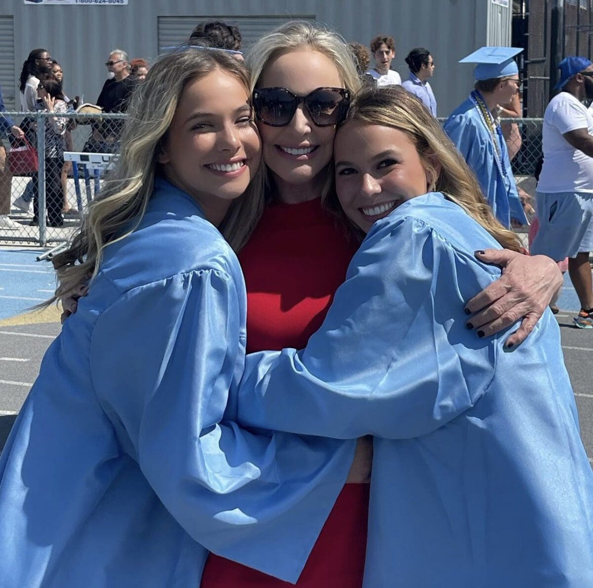 RHOC's Shannon Beador poses with daughters Adeline and Stella at their high school graduation.