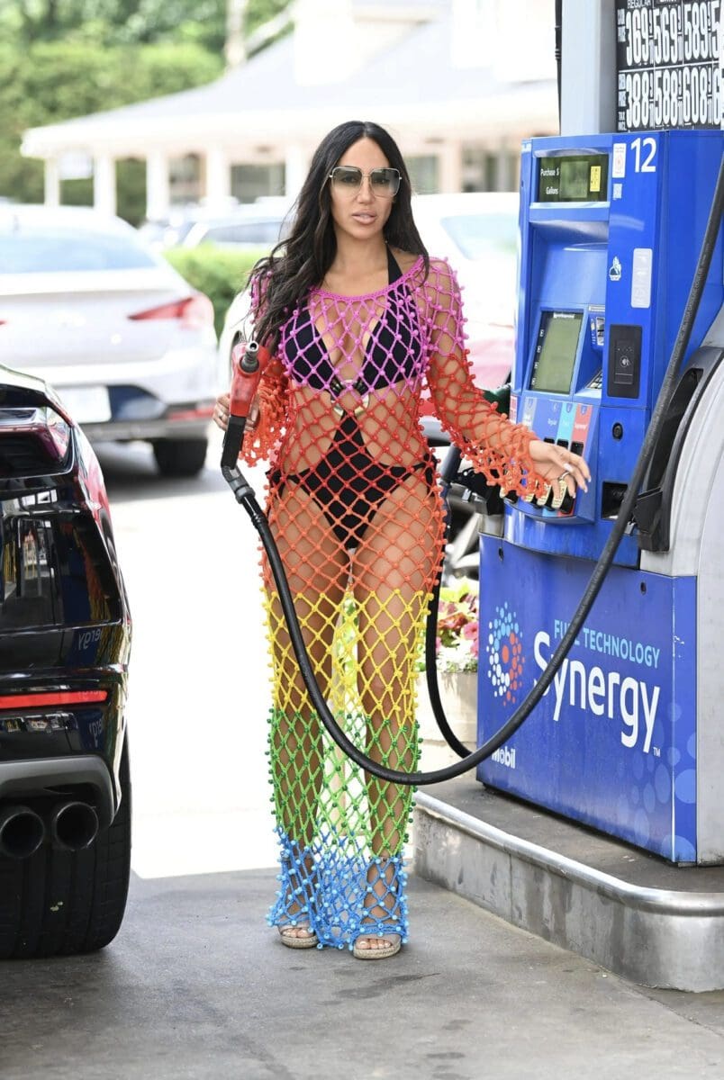 RHONJ's Melissa Gorga Spotted Pumping Gas in a Rainbow Crochet Dress
