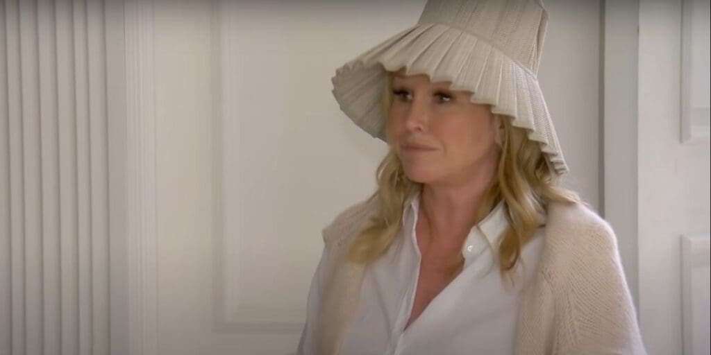 Kathy Hilton wears white hat and outfit while showing off her new house on RHOBH