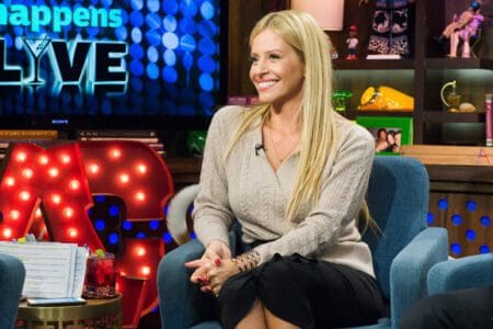 RHONJ alum Dina Manzo smiles while appearing on WWHL