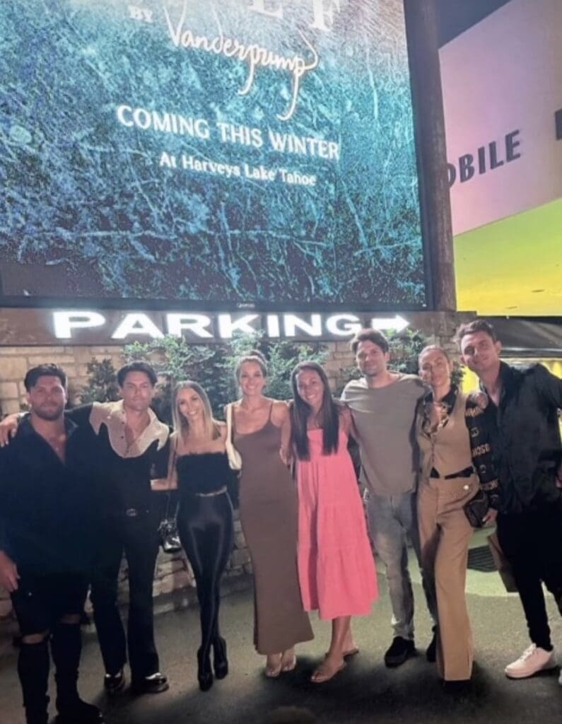 Scheana Shay, Tom Sandoval, Tom Schwartz, James Kennedy, Ally Lewber, Lala Kent, and Brock Daviesis pose for photo with Pump Rules fan outside of Lisa Vanderpump's new restaurant Wolf