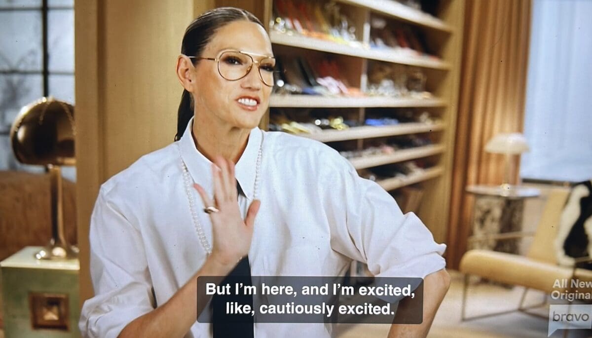 Jenna Lyons looks chic in her confessional interview with clear classes and white button down top