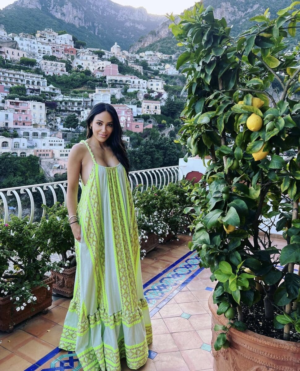 Melissa Gorga poses for a photo next to a lemon tree on her hotel balcony in Positano