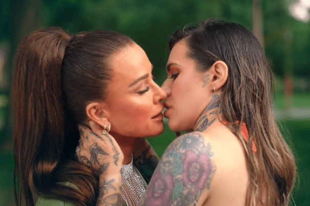 Kyle Richards and Morgan Wade almost kiss music video for Morgan's song "Fall in Love With You."
