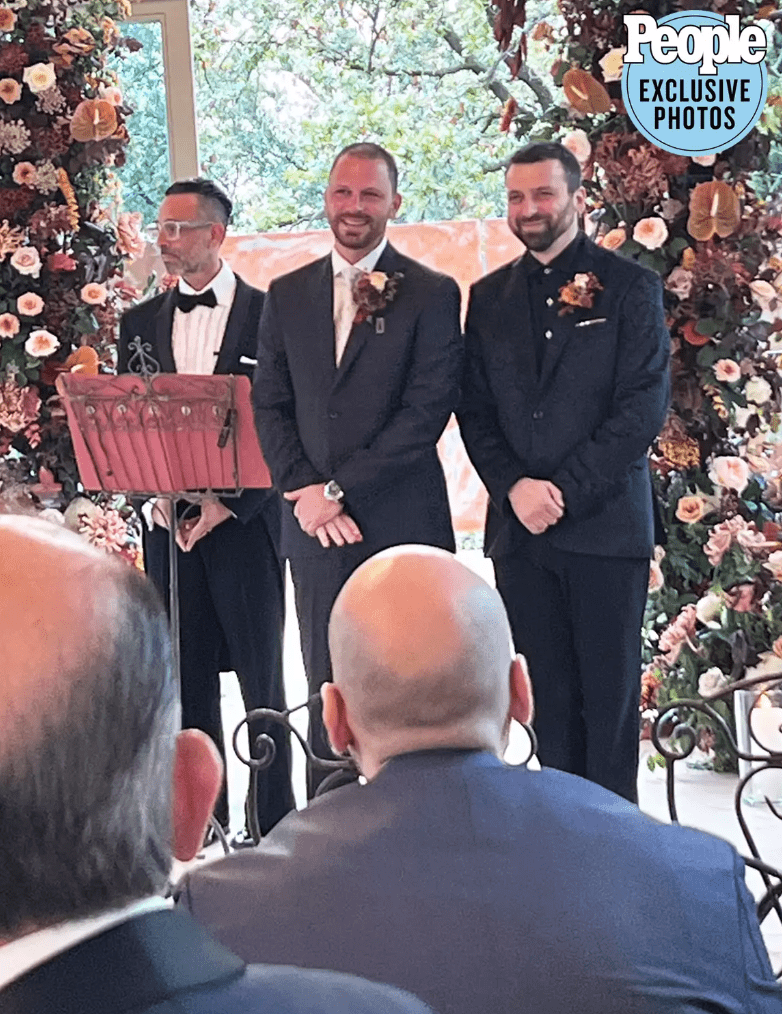 Albie Manzo and Chris Manzo at the alter.