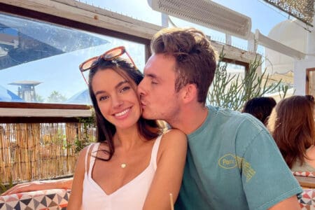 James Kennedy kisses girlfriend Ally Lewber on the cheek while taking a cute couple's photo.